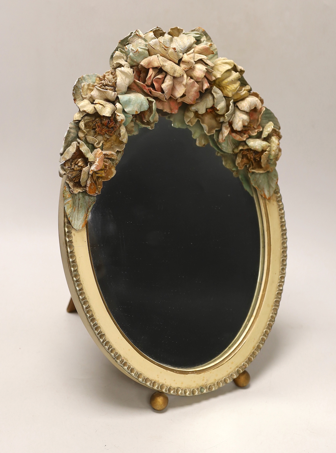 A painted leather floral easel mirror, 40cm tall